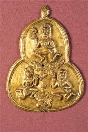 Arte Tibetana  A gilded copper plaque Tibet, 17th century .