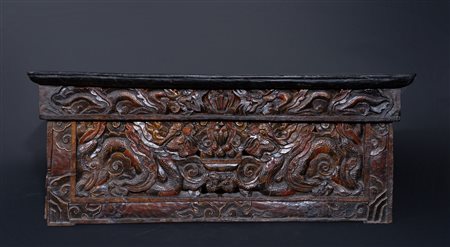 Arte Himalayana  A wooden carved folding devotional altar Tibet, 19th century .