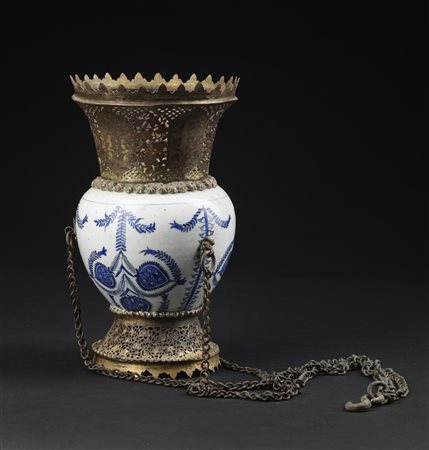 Arte Islamica  A Kutahya blue and white pottery vase mounted as a censer with tombak fittings  Ottoman Turkey, 18th century .