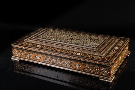 Arte Islamica  A large mother of pearl  inlaid Quran holder box with printed Quran insideNear East, 20th century .