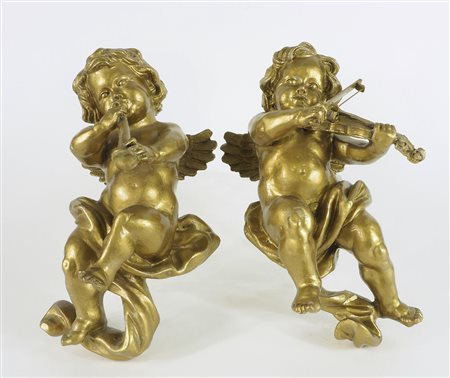 Coppia di putti da parete