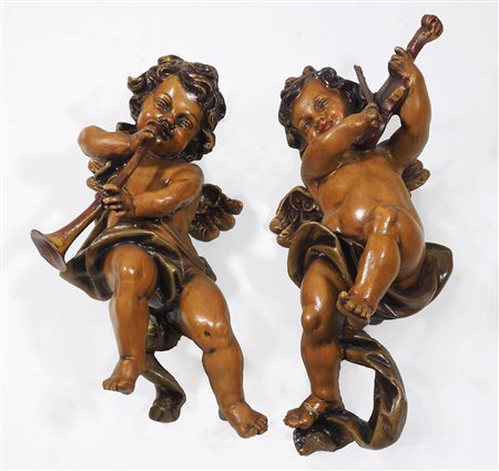 2 putti suonatori