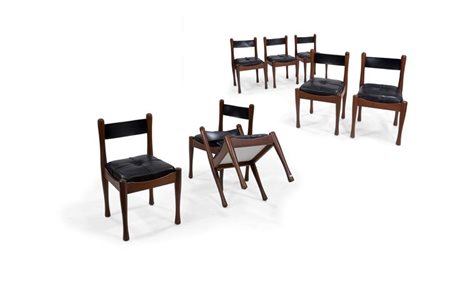 COPPOLA SILVIO 620 Otto sedie in legno massello di noce con gambe tornite,...