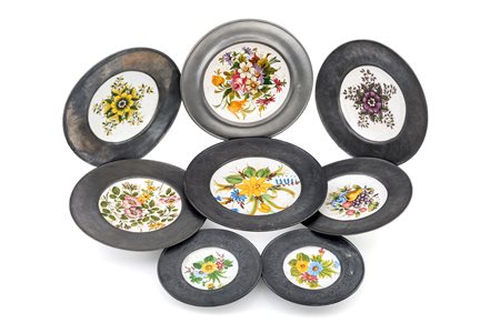 
 

Twelve majolica and pewter plates