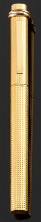 CARTIER Penna a sfera, firmata "Cartier", laminata oro giallo. Corredata di...