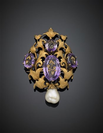 Broche in oro giallo con ametiste intarsiate per complessivi ct. 40,00 circa e