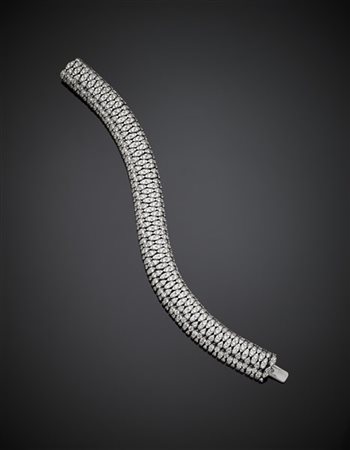 Bracciale flessibile in oro bianco e diamanti rotondi per complessivi ct. 20 ci