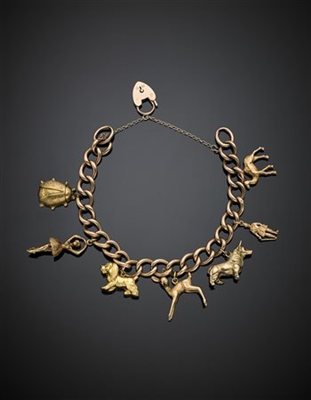 Bracciale a catena con otto charms tutto in oro da giallo a rosso 333/1000 e un