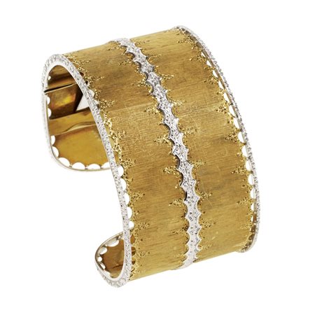 BRACCIALE IN ORO GIALLO E BIANCO, BUCCELLATI realizzato a schiava a fascia...