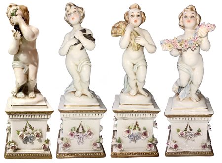 4 statuette in porcellana di Capodimonte. 4 stagioni. H Cm 19. Base Cm 6x6....