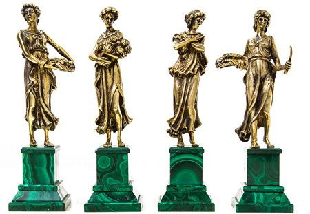 4 miniature in argento vermeil, le 4 stagioni. Base in malachite. H Cm 21