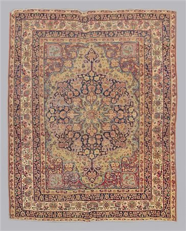 Tappeto Kirmam, Persia, secolo XIX.
Decoro a medaglione (cm 180x123) (difetti e