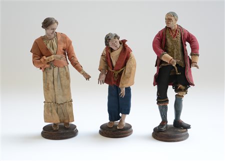 Lotto composto da tre figure da presepe del secolo XIX raffiguranti pastori con