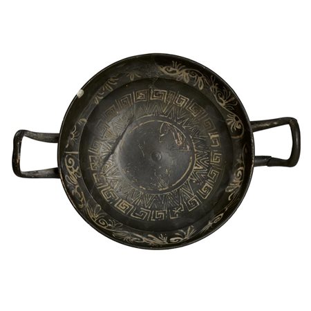 KYLIX A VERNICE NERA DATAZIONE: IV sec. a. C. MATERIA E TECNICA: argilla...