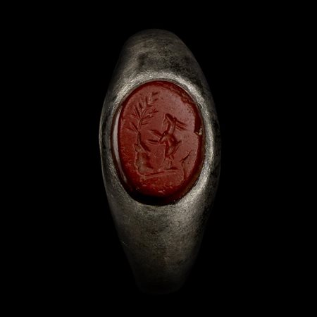 ANELLO ROMANO IN ARGENTO DATAZIONE: III-IV sec. d. C. MATERIA E TECNICA:...