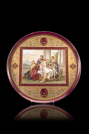 Manifattura di Vienna, secolo XIX. Piatto in porcellana decorata in policromia