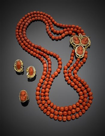 TOSCHI
Demi-parure in corallo arancione composta da lunga collana a tre fili di