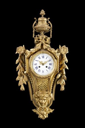 ANONIMO, Francia
Orologio da parete del tipo “Cartel” con cassa in bronzo dorat