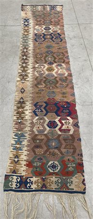 Tappeto Kilim, Anatolia, secolo XIX.
Decoro a granchi policromi su fondo rosa,