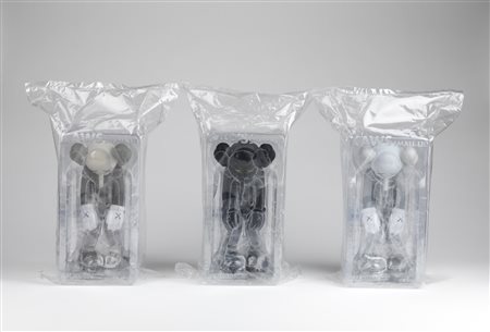 KAWS  Tre Sculture: (i) Small Lie (Brown); (ii) Small Lie (Black); (iii) Small Lie (Grey).