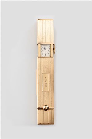 CARTIER<BR>Particolare portarossetto con orologio