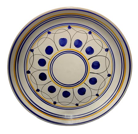 Piatto in maiolica di Caltagirone, Sicilia. Raffigurante fiore, anni '50....