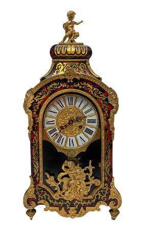 Orologio stile Boulle lastronato, fine XIX secolo. Applicazioni in ottone...