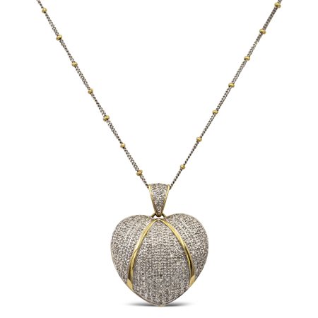 Pendente cuore in oro giallo e bianco 18ktpeso 11,6 gr.pavé di diamanti...