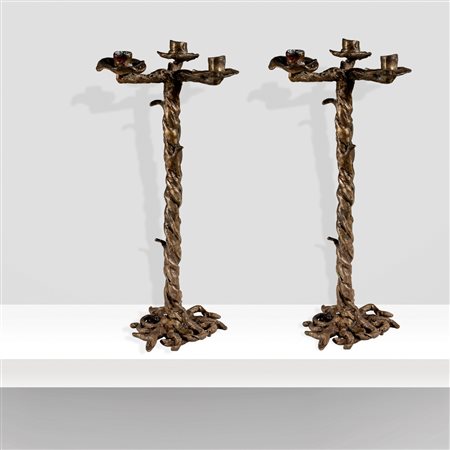 Manifattura italiana (2)anni 50-60h. 43 cm.coppia di candelabri in bronzo