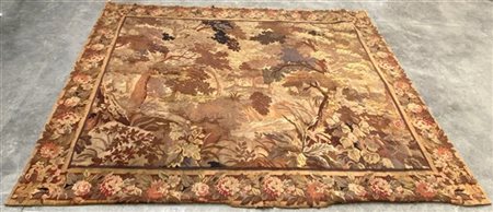 Arazzo tessuto a mano in lana, Italia secolo XIX. 
Decorato da un paesaggio alb