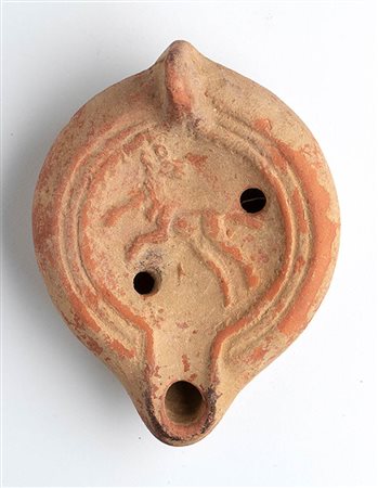 Roman African Oil Lamp with Running Dog, 4th - 6th century AD; height cm 5, length cm 12