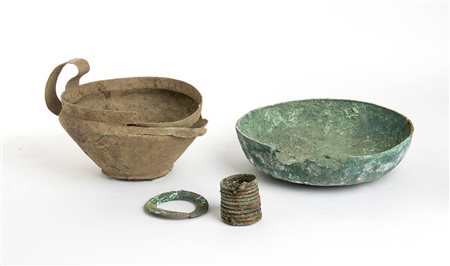 Group of Etruscan Bronze Vessel and Ornaments, 7th - 4th century BC; height max cm 13,5, diam. cm 22,5