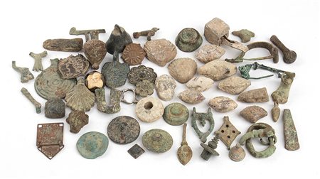 Group of Several Roman Bronze and Lead Items, from 3rd century BC; length max (fibula with needle) cm 5,3 - min (squared plaquette) cm 1.