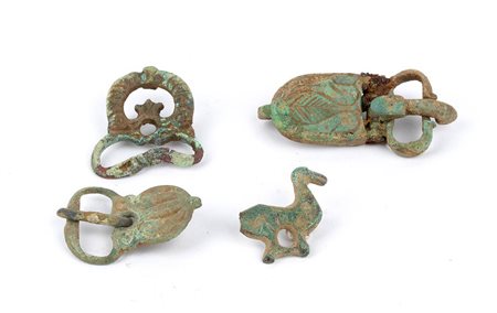 Group of Four Lombards Bronze Belt-Buckles, 6th - 8th century AD; length cm 6,5/3