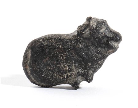 Egyptian Basalt Amulet in the Shape of a Tied Ox, New Kingdom, Dynasty XVIII-XX, 1550 - 1070 BC; length cm 3,5