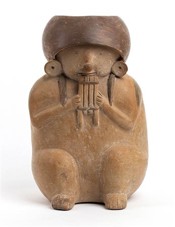 Jar in the shape of a Musician playing pan pipe, Perù, Chancay Culture, ca. 11th - 14th century; height cm 28, diam. cm 9,5