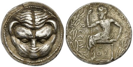 Bruttium, Rhegion, Tetradrachm, ca. 445-435 BC. AR (g 16,92; mm 27; h 3). Facing lion's head, Rv. RECIИ-OS (S retrograde), Iokastos seated l., holding scepter; all within laurel wreath. HN Italy 2483; SNG ANS 635-7 var. (ethnic); 