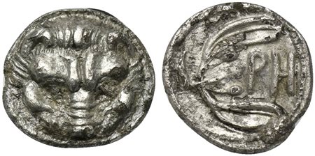 Bruttium, Rhegion, Litra, ca. 415/0-387 BC; AR (g 0,60; mm 10; h 2); Facing lion’s head; Rv. PH within olive sprig. HNItaly 2499; SNG ANS 670-4. Near very fine