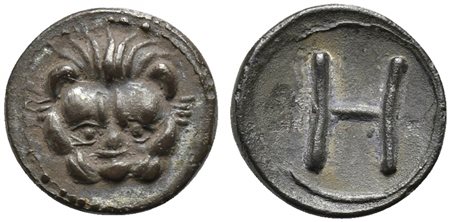 Bruttium, Rhegion, Hemilitron, ca. 415-387 BC; AR (g 0,26; mm 8; h 11); Facing lion's head; Rv. Large H. HNItaly 2500; SNG ANS 675. Good extremely fine