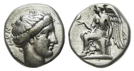 Bruttium, Terina, Stater, ca. 420-400 BC; AR (g 7,04; mm 18,5; h 6). Head of the nymph Terina r.; Rv. Nike seated l. on plinth, holding out r. hand upon which a small bird alights, l. hand resting on plinth. HNItaly 2617. Very fin