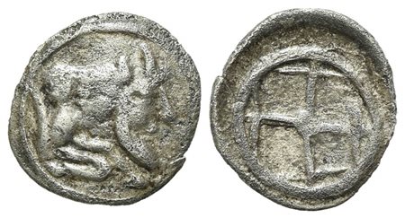 Sicily, Gela, Obol, ca. 480/75-475/70 BC. AR (g 0,38; mm 10). Forepart of man-headed bull r.; Rv. Wheel with four spokes. Jenkins, Gela, 198; HGC 2, 372. Near very fine