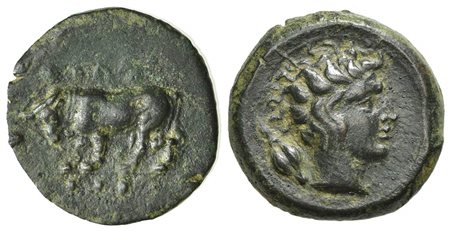 Sicily, Gela, Tetras, ca. 420-405 BC; AE (g 3,93; mm 18; h 3); ΓEΛAΣ, Bull standing l., head lowered; barley grain above, three pellets in exergue Rv. Head of the river-god Gelas r., hair flowing behind; grain ear behind. CNS 32; 