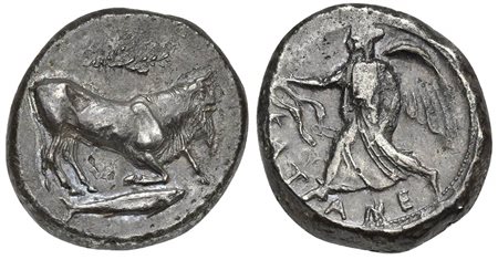 Sicily, Katane, Tetradrachm, ca. 470-465 BC. AR (g 16,90; mm 27; h 5). Recumbent man-headed bull r.; above, branch; in ex. fish r., Rv. KAT - ANE, Nike advancing l., holding wreath tied with fillet. Rizzo pl. IX, 4; SNG Ashmolean 