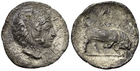 Sicily, Kephaloidion, Litra, ca. 396-367 BC; AR (g 0,67; mm 13; h 3); KEΦAΛOIΔITAN, Head of Herakles r., wearing lion skin; Rv. HPAKΛEIΩTAN, Bull butting r.; monogram above. Campana 3; HGC 2, 643. Rare, Good very fine