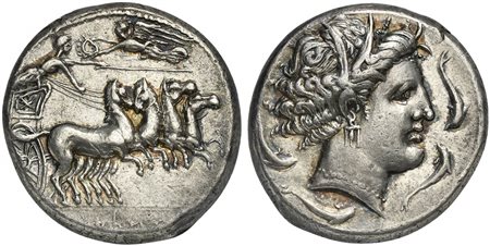 Sicily, Kephaloidion, Tetradrachm, ca. 360-330 BC. AR (g 16,86; mm 26; h 12). Charioteer driving fast quadriga r., holding kentron and reins; above, Nike flying l., crowning charioteer; in ex. Ršmlqrt in Punic characters, Rv. Head