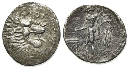 Sicily, Leontini, Litra, ca. 455-430 BC. AR (g 0,66; mm 12.5; h 1). ΛEO - N, head of a roaring lion r.; Rv. River god, nude, standing l., pouring libation on altar from patera and cradling olive branch; on r., barley grain. SNG AN