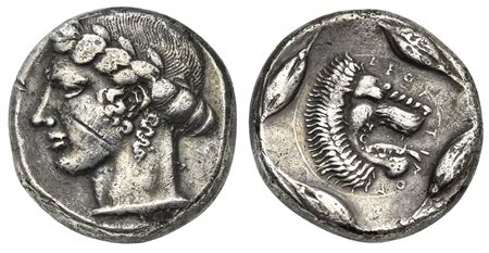 Sicily, Leontini, Tetradrachm, ca. 440-430 BC. AR (g 17,02; mm 24; h 2). Laureate head of Apollo l., Rv. head of roaring lion r. within linear circle; around four barley grains. Boehringer, Münzgeschichte 51 (same obv. die, but re