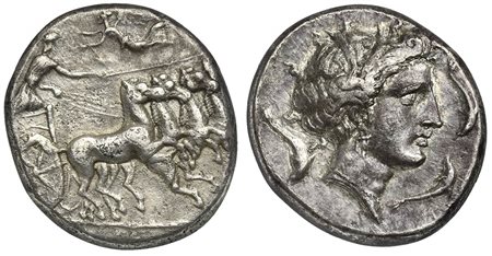 Sicily, Lilybaion (as ‘Cape of Melkart’), ca. 330-305 BC; AR Tetradrachm (g 16,80; mm 26; h 2); Charioteer driving fast quadriga r.; above, Nike flying l., crowning charioteer Rv. Wreathed head of Kore-Persephone r.; four dolphins