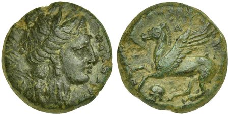 Sicily, Nakona, Bronze, ca. 357-317 BC. AE (g 8,54; mm 20; h 6). ΚΑΜΠΑΝΩΝ, wreathed head of Kore r., Rv. ΝΑΚΩΝΗΣ, Pegasos flying l.; below, helmet. CNS 4. Rare. Green patina and about extremely fine.