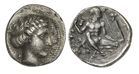 Sicily, Naxos, Didrachm, ca. 420-403 BC. AR (g 7,04; mm 22; h 1). ΝΑΞΙΩΝ, Youthful head of Apollo r., wearing laurel wreath; behind, olive leaf and berry behind, Rv. Silenos, nude and bearded, squatting half-right, head l., holdin